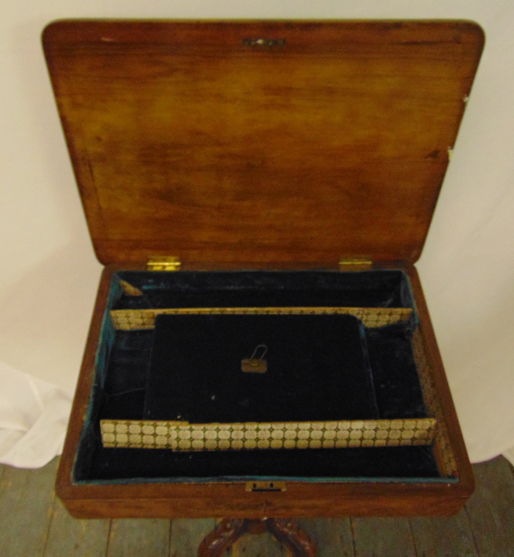 A Victorian rectangular walnut work table with hinged inset leather top on four carved scrolling - Image 2 of 2