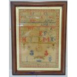 A Victorian framed and glazed sampler by Rachel McFarlane aged 10 1880, 41 x 28cm