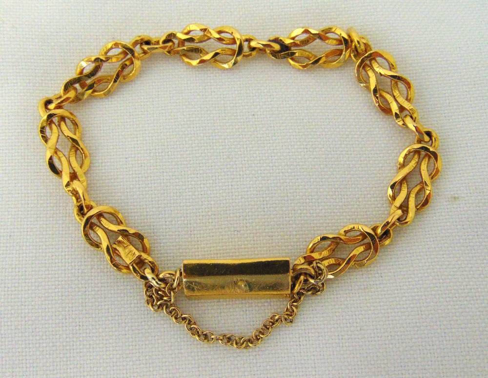 A gold fancy link bracelet, tested 18ct approx total weight 15.7g