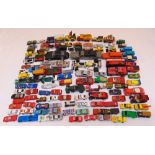 A quantity of diecast cars and trucks all playworn