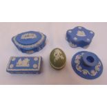 A quantity of Wedgwood Jasperware to include covered dishes and a candle holder (5)