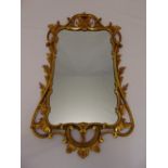 A gilt wood rectangular Rococo style wall mirror, 89.5 x 50cm