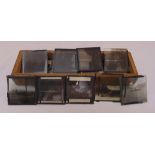 A quantity of early 20th century glass monochromatic photographic slides of buildings and landscapes