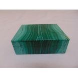 A Russian rectangular malachite box with hinged cover 10 x 8 cm