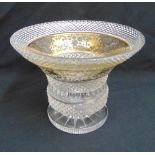 A continental faceted glass bowl of campagna form decorated with gilded flowers and scrolls on raise