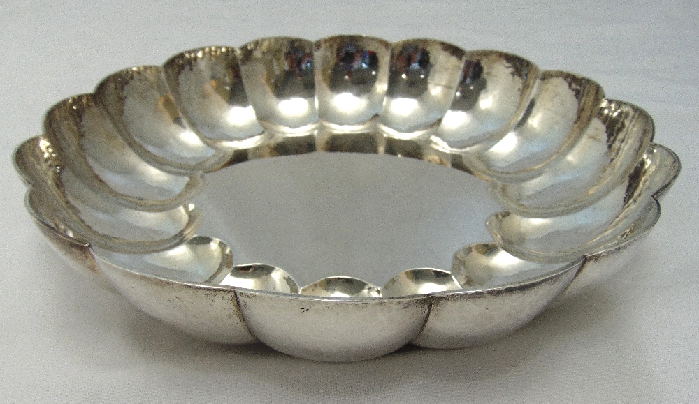 A hallmarked silver fruit bowl hand hammered lobbed sides, London 1968 by Richard Comyns, approx