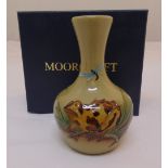 Moorcroft clay coloured vase decorated with a frog and dragonfly, signed to the base, in original