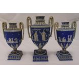 A suite of Adams blue Jasperware vases of classical form on raised square bases, A/F, tallest