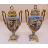 A pair of Vienna vases and covers decorated with classical scenes, gilded side handles and raised