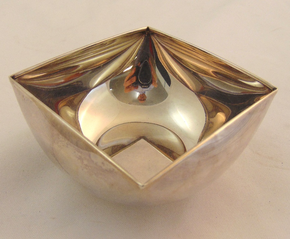 A white metal olive bowl of lobbed square section stamped Sterling 925, approx total weight 190g,