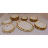 Minton dinner service with gilded border to include plates, bowls, serving dishes and platters (39)