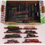 A quantity of diecast scale models of train engines mounted on rectangular plinths (40)