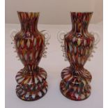 A pair of Murano polychromatic glass vases with side handles on raised circular bases, 17.5cm (h)