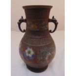 An Oriental bronze vase of baluster form inlaid with cloisonne geometric and organic forms with
