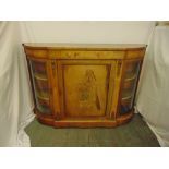A Victorian walnut credenza shaped oval with glazed side cabinets and inlaid hinged door on raised
