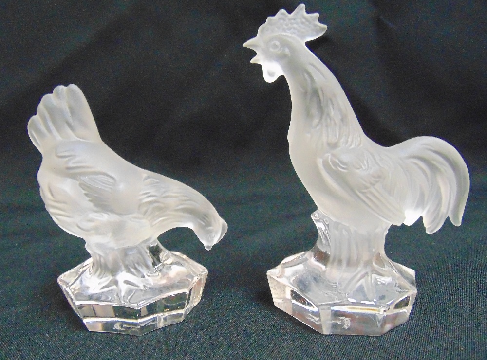 Two Nachtman glass figurines of a cockerel and a chicken on raised octagonal bases, 11cm and 9cm (