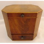 A Regency mahogany octagonal tobacco box, the hinged cover revealing lead lined interior with single