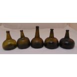 Five onion bottles of various size with elongated necks, tallest 21cm (h)