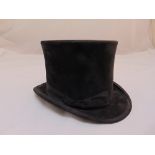 A silk top hat by J W Gargett of Stockton on Tees