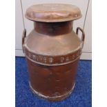 A late 19th century copper milk churn stamped Wrington Vale United Dairies with two side handles,