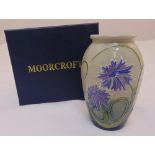 Moorcroft clay coloured vase with lilac flowers, marks to the base, in original packaging,10cm (h)