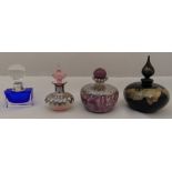 Four glass perfume bottles, three with hallmarked silver overlays, tallest 11cm (h)