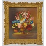 A framed oil on panel still life of flowers indistinctly signed bottom right, 49 x 43.5cm