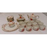 A Herend Chinese bouquet teaset to include a teapot, sugar bowl, a milk jug, cups and saucers (35)