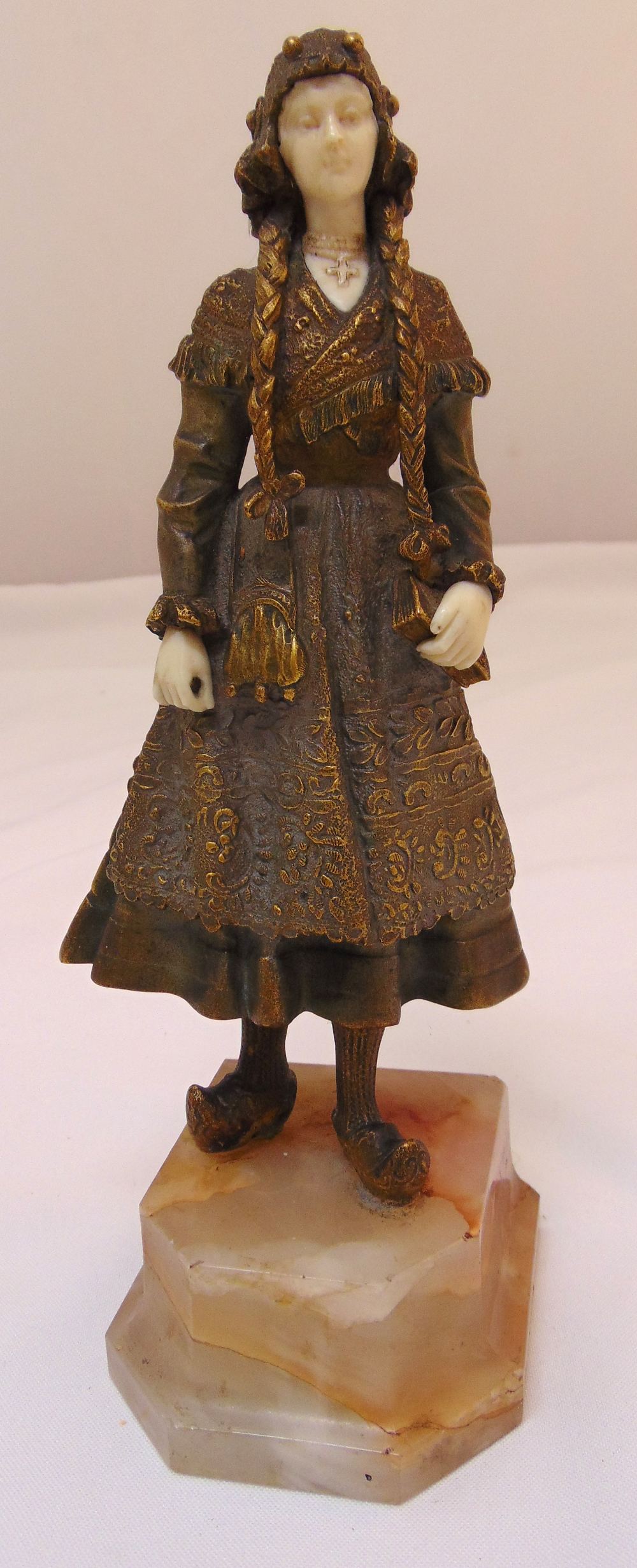 Rene Paul Marquet gilded bronze figurine of a Dutch girl in traditional attire, mounted on an