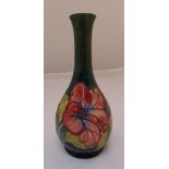 Moorcroft baluster vase, decorated with flowers and leaves, signed to the base, 27cm (h)