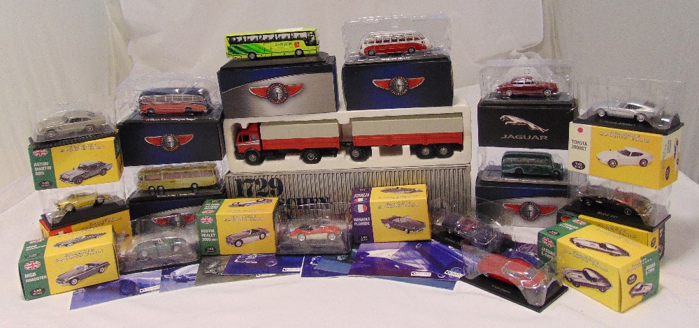 A quantity of diecast models to include sports cars, coaches and a Mercedes Benz truck (15)