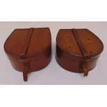 Two early 20th century leather collar boxes of horseshoe form, with leather straps to hinged covers,