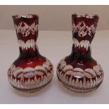 A pair of Bohemian red overlaid glass vases, 21cm (h)