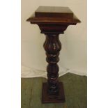 A mahogany plant stand, rectangular on lobed and knopped baluster stem and raised rectangular