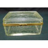 A rectangular French glass dressing table box with ormolu mounts engraved throughout with flowers,