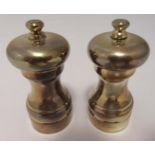 A pair of hallmarked silver salt and pepper grinders of customary form, Birmingham 1995