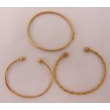 Three 9ct gold bangles, approx total weight 16.1g