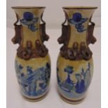 A pair of Chinese crackle glazed baluster vases decorated with figures playing chess, 28cm (h)