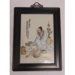 A Chinese Republic period porcelain panel hand painted with an image of an elder, all in hardwood