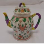 A Dresden miniature teapot decorated with flowers and leaves in the oriental style, 14cm (h)