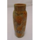 A Doulton Lambethware vase of tapering cylindrical form with naturalistic brown leaf decoration,