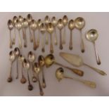 A quantity of hallmarked silver spoons and servers