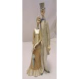 Lladro figural group of a lady with an umbrella and a man with a top hat, marks to the base, 50cm (