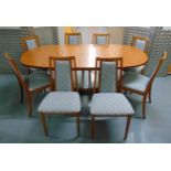 G-Plan extending oval teak dining table circa 1970 and eight matching dining chairs with upholstered