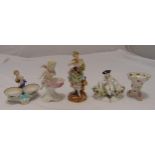 A quantity of porcelain to include 18th century style figurines, salt cellars with putti and a