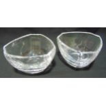 A pair of Tiffany and Co. triform shaped clear glass bowls, etched to the bases, 9.5cm (h)