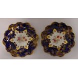 A pair of 19th century Aynsley cabinet plates decorated with flowers and gilding, 22cm (d)