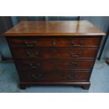 A 19th century rectangular mahogany chest of drawers, the four drawers with brass swing handles,