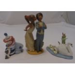 Three Lladro figurines to include a kissing couple, a clown and swan with signets, tallest 21cm (h)