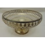 A hallmarked silver circular fruit stand, circular scroll pierced sides, husk border on domed